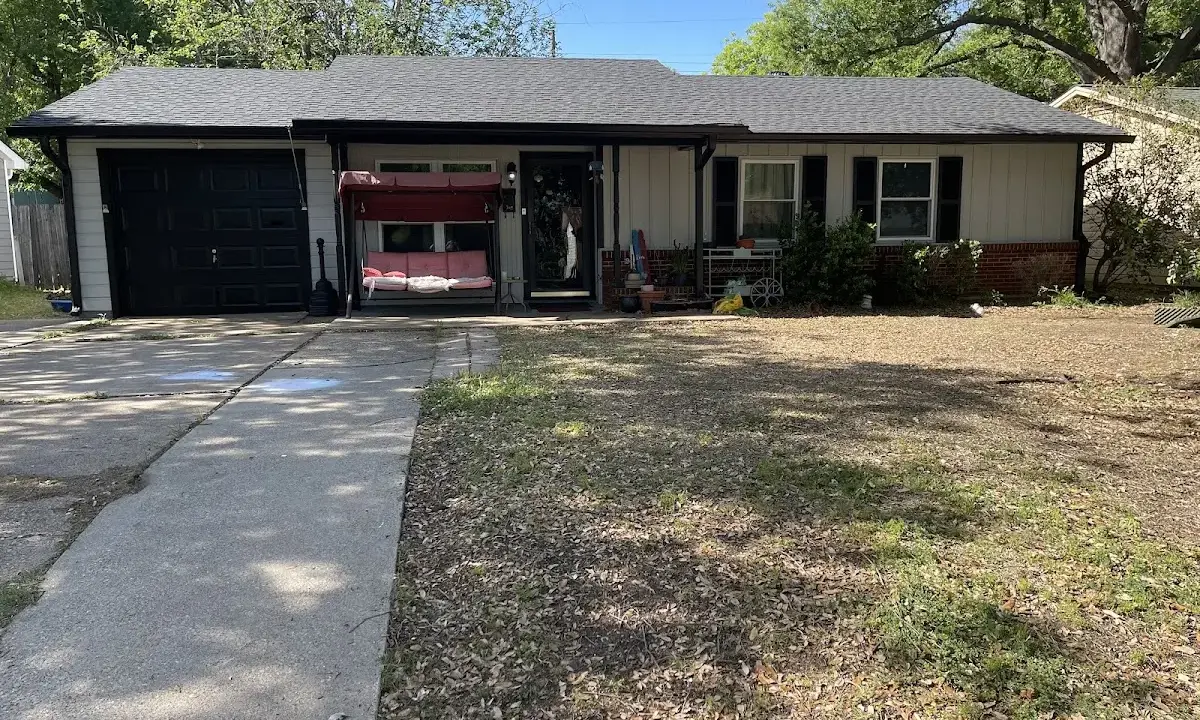 Roof Replacement crew at work on a residential roof in Sebring